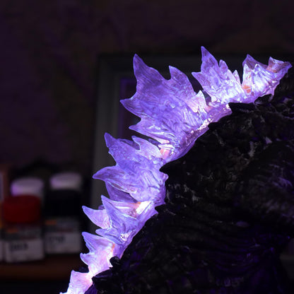 Close-up of Mistzilla glowing crystal dorsal fins