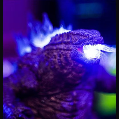 Close-up of Mistzilla head with atomic mist glowing blue